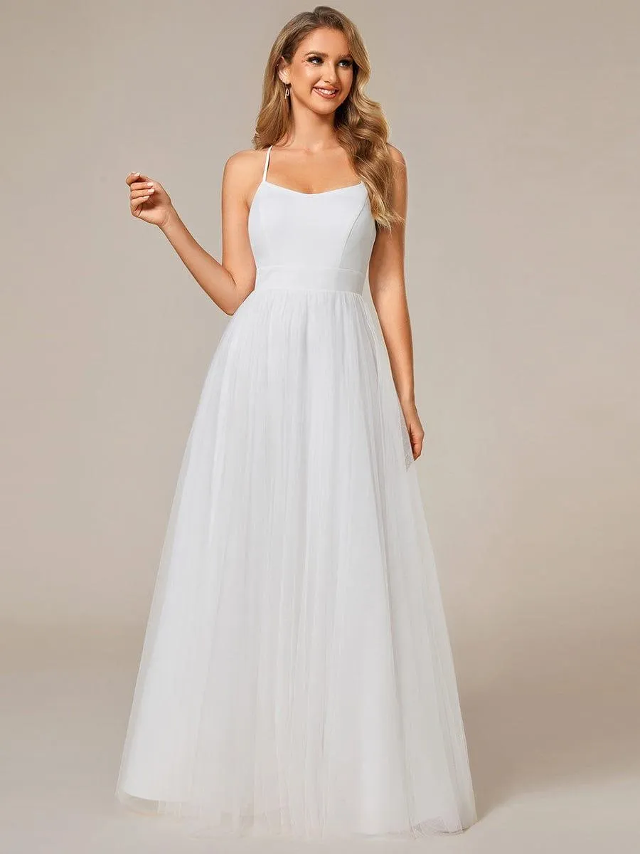 Robe de mariée trapèze avec veste en dentelle et bretelles spaghetti