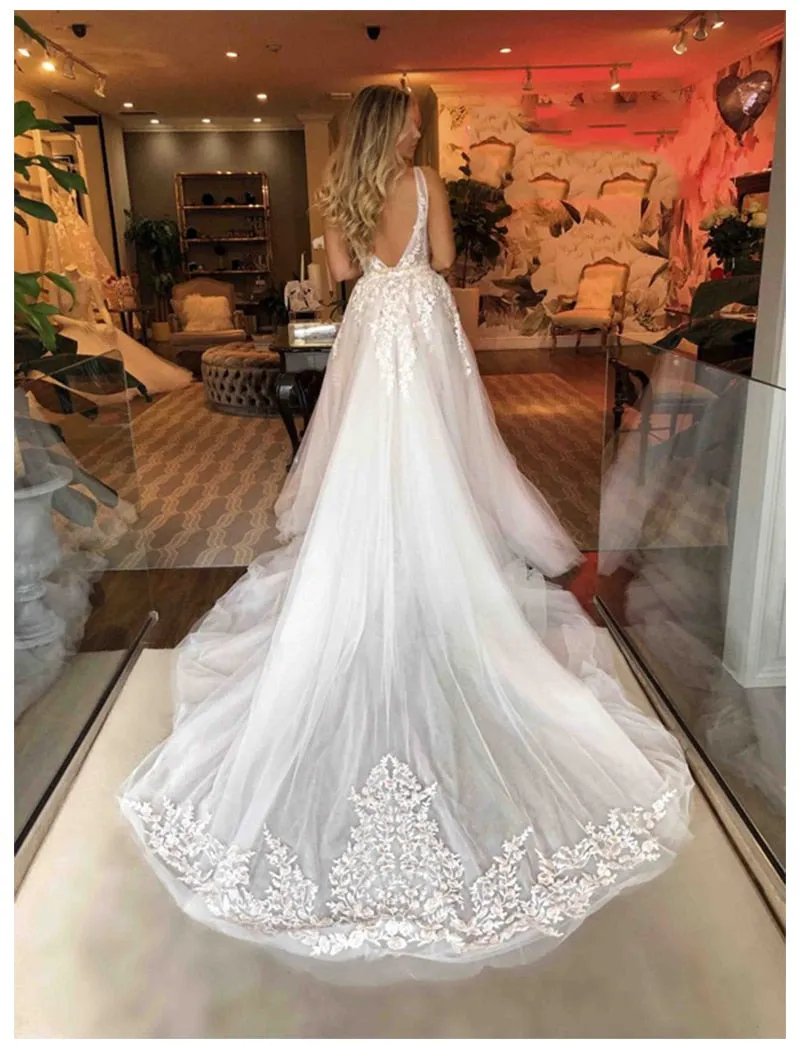 Sexy Illusion  Wedding Dress With  Long Train Deep V Neck And Low Back Lots Of Appliques