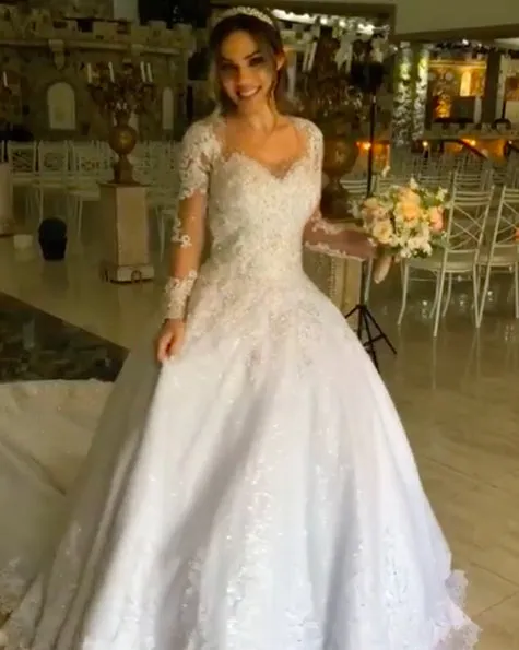 Sparkly 2019 Lace Wedding Dresses Sheer Long Sleeve Appliques Sexy Bridal Gowns