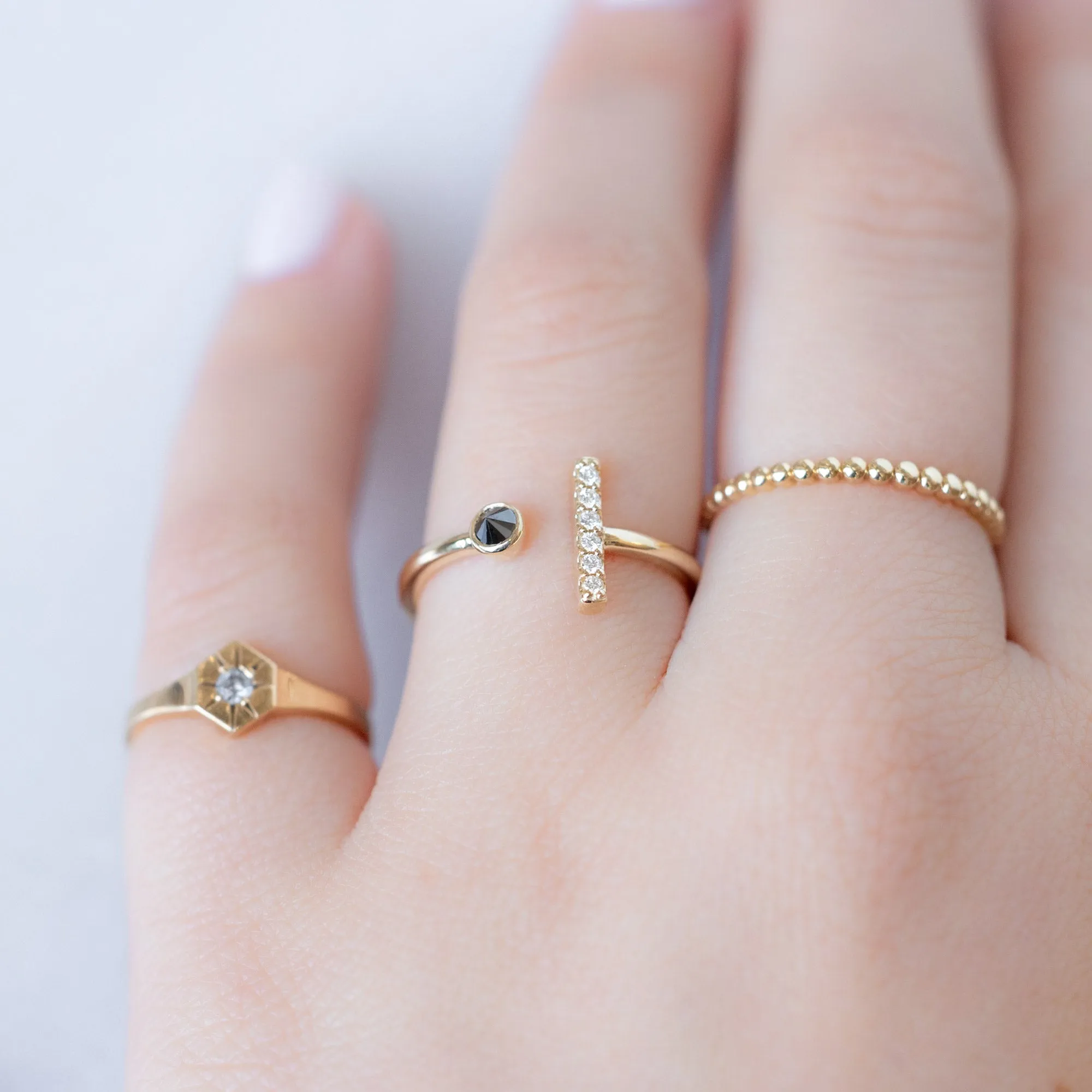 The Black   White Diamond Linea Ring | 14K Yellow Gold